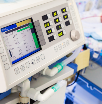 Close-up of a hospital medical device monitor with digital display, representing HTM consulting and healthcare technology management services.